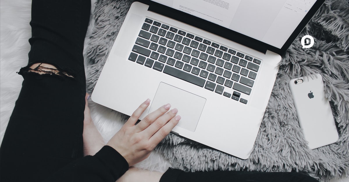 custom short urls woman clicking laptop touchpad
