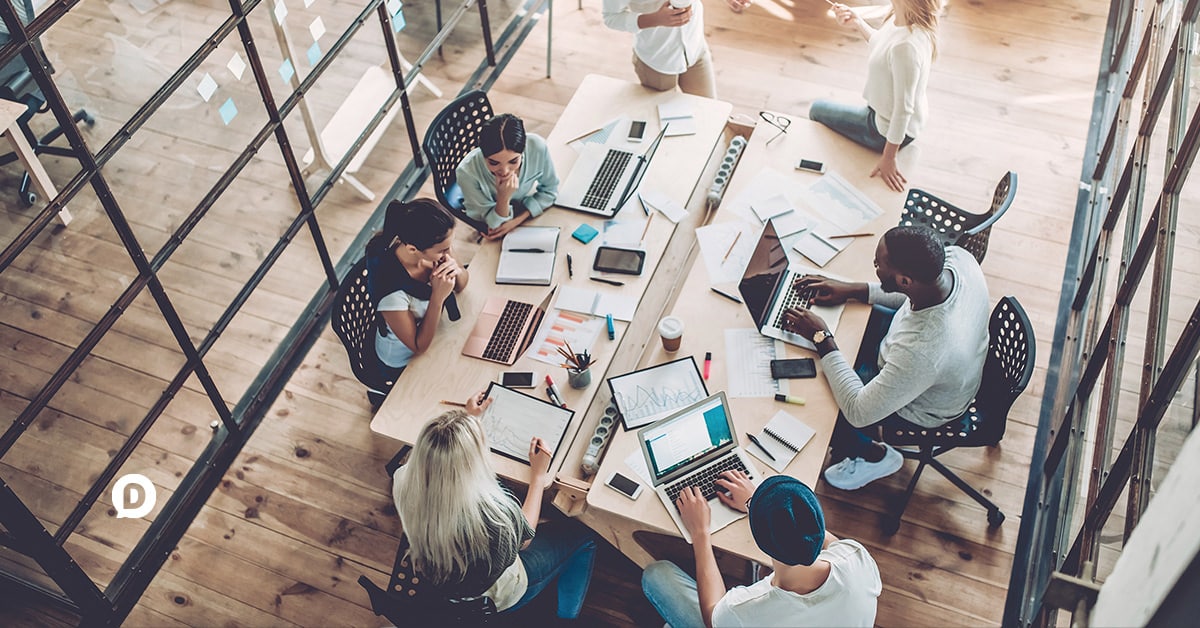 group of people working at a desk