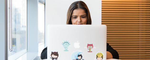 business-woman-working-laptop-while-sitting-table-work-from-home