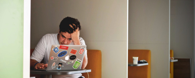 man feeling bored while working from home