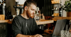 Best Practices for Terraform Engineers: man using laptop in café