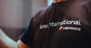 Nearshore solutions: we see a black t-shirt with white lettering that reads "You, international."