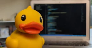 Debugging Hacks: Rubber Duck in front of computer